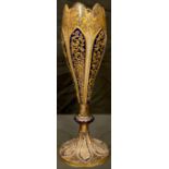 A 19th century Bohemian blue flashed tulip shaped pedestal vase, applied with raised tooled gilt
