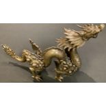 A Japanese patinated bronze of a dragon, 27cm long