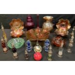 An Egyptian glass scent bottle with stopper; others; Carnival glass dishes; a cranberry style vase