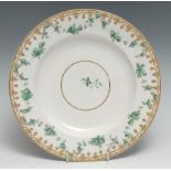 A Chelsea Derby circular plate, painted with green foliate swags outline in black, in the style of