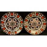 A Royal Crown Derby Imari palette 1128 pattern diner plate, 26.5cm, first quality; another, second