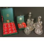 A cut glass ship's decanter, other decanters; a set of six Thomas Webb Crystal sherry glasses,