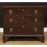 A George III oak chest, rectangular top above three long graduated drawers, brass handles, skirted