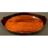 A mid 19th century oval coopered mahogany serving tray, scroll handles, 51.5cm wide
