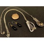 A hallmarked silver and agate set Irish harp pendant; a gold locket; gold mounted earrings and a
