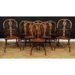 A set of eight Windsor dining chairs, possibly Titchmarsh & Goodwin, comprising six side chairs