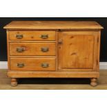 A Victorian pine sideboard, rectangular top above three drawers and a cupboard, 81cm high, 121cm