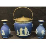 A Wedgwood Jasperware biscuit barrel, EPNS mounted; two Wedgwood Jasperware vases (3)