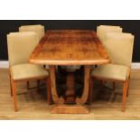 An Art Deco walnut draw-leaf dining table, 77cm high, 123cm extending to 169cm long, 83cm wide; a