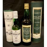 A bottle of Islay single malt Scotch whisky, 70cl; a bottle of Laphroaig Islay single malt Scotch