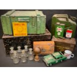A wooden ammunition box; another, metal case; a 20L jerry can; a kit box; a set of six acid etched
