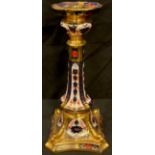 A Royal Crown Derby Imari palette 1128 pattern Castleton candlestick, dolphins to angles, 27cm,