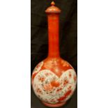 A Japanese Kutani bottle vase and cover, painted with birds perched amongst blossom, 39.5cm,