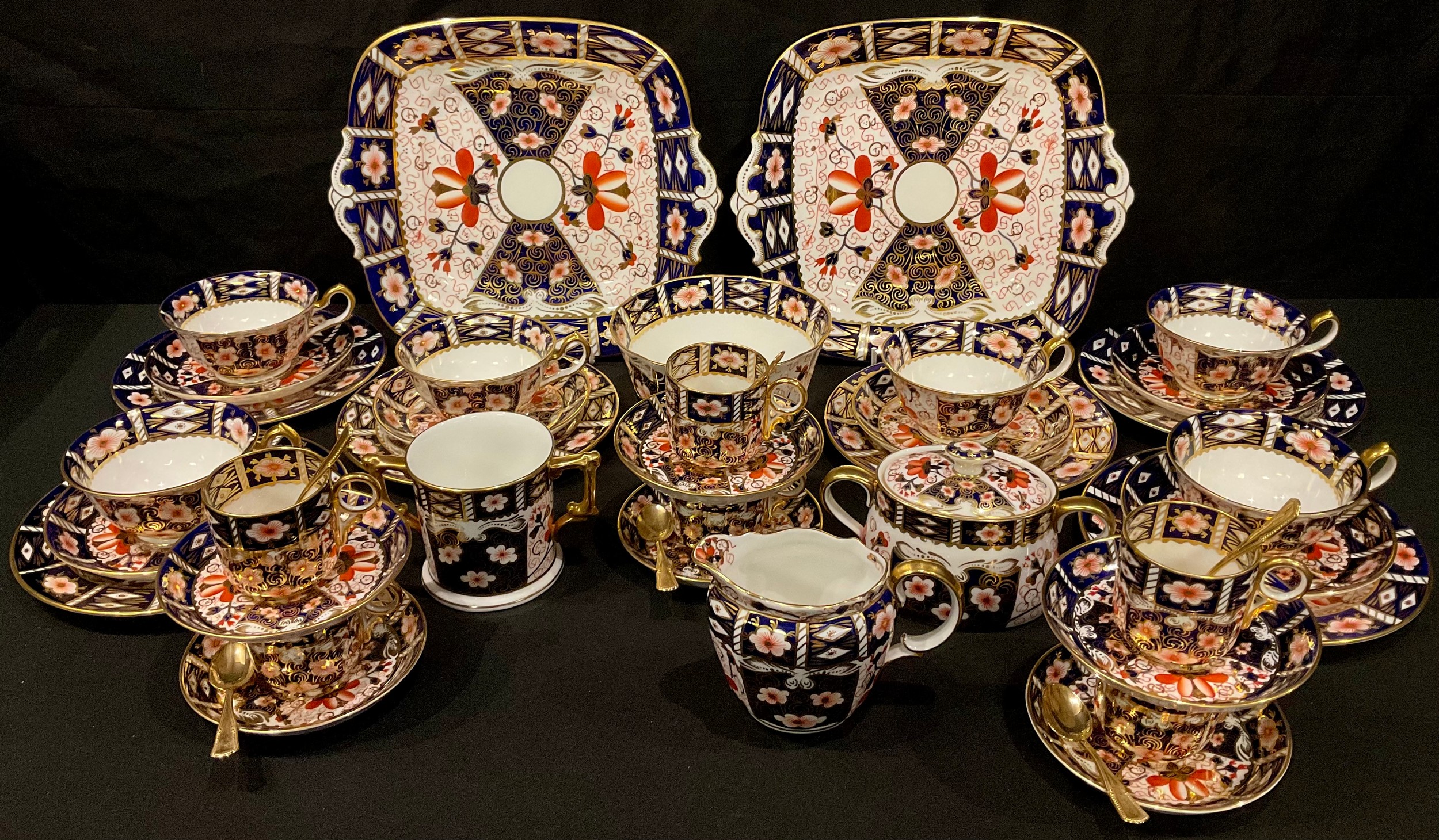 A Royal Crown Derby Imari palette 2451 pattern tea and coffee set, comprising six teacups, saucers