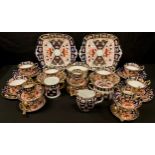 A Royal Crown Derby Imari palette 2451 pattern tea and coffee set, comprising six teacups, saucers