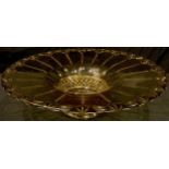 An early 20th century pressed smoky glass pedestal dish, 42cm diameter, c.1920