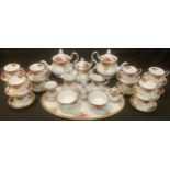 A Royal Albert Old Country Roses pattern tea set comprising twelve teacups and saucers, two large