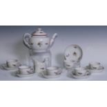 A Coalport part tea service, comprising boat shaped teapot, cream jug, six cups and saucers, each