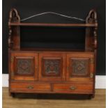 A late Victorian walnut wall-hanging cabinet, rectangular shelf with shaped and pierced end supports
