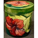 A Moorcroft Hibiscus pattern cylindrical jar and cover, 10cm, paper label, impressed marks