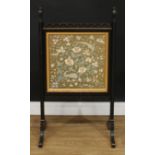 A late Victorian ebonised and parcel-gilt fire screen, 101cm high, 56cm wide