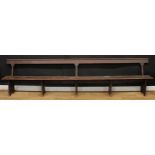 A large early 20th century country house servants? quarters bench, 82.5cm high, 349.5cm wide, the