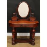 A Victorian mahogany duchess dressing table, of unusually small proportions, oval mirror above a