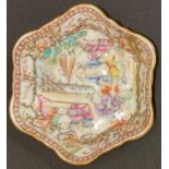 An 18th century Chinese shaped hexagonal spoon tray, painted in polychrome, 12.5cm diameter, c.1760