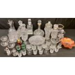 Glassware - a cut glass decanter with silver collar, Birmingham 2003; other decanters; cut glass