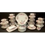 A Royal Albert Lavender Rose pattern tea set comprising, teapot, teapot stand, milk jug and sugar