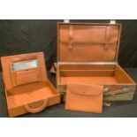 A mid 20th century gentleman's leather travel case fitted with secondary grooming/document case,