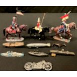 Toys and Juvenalia - miniature lead ships; a motorcycle; a zeppelin; soldiers on horseback including