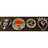 Three silver and stone set Scottish brooches; another (4)