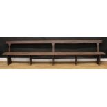 A large early 20th century country house servants? quarters bench, 82cm high, 349.5cm wide, the seat