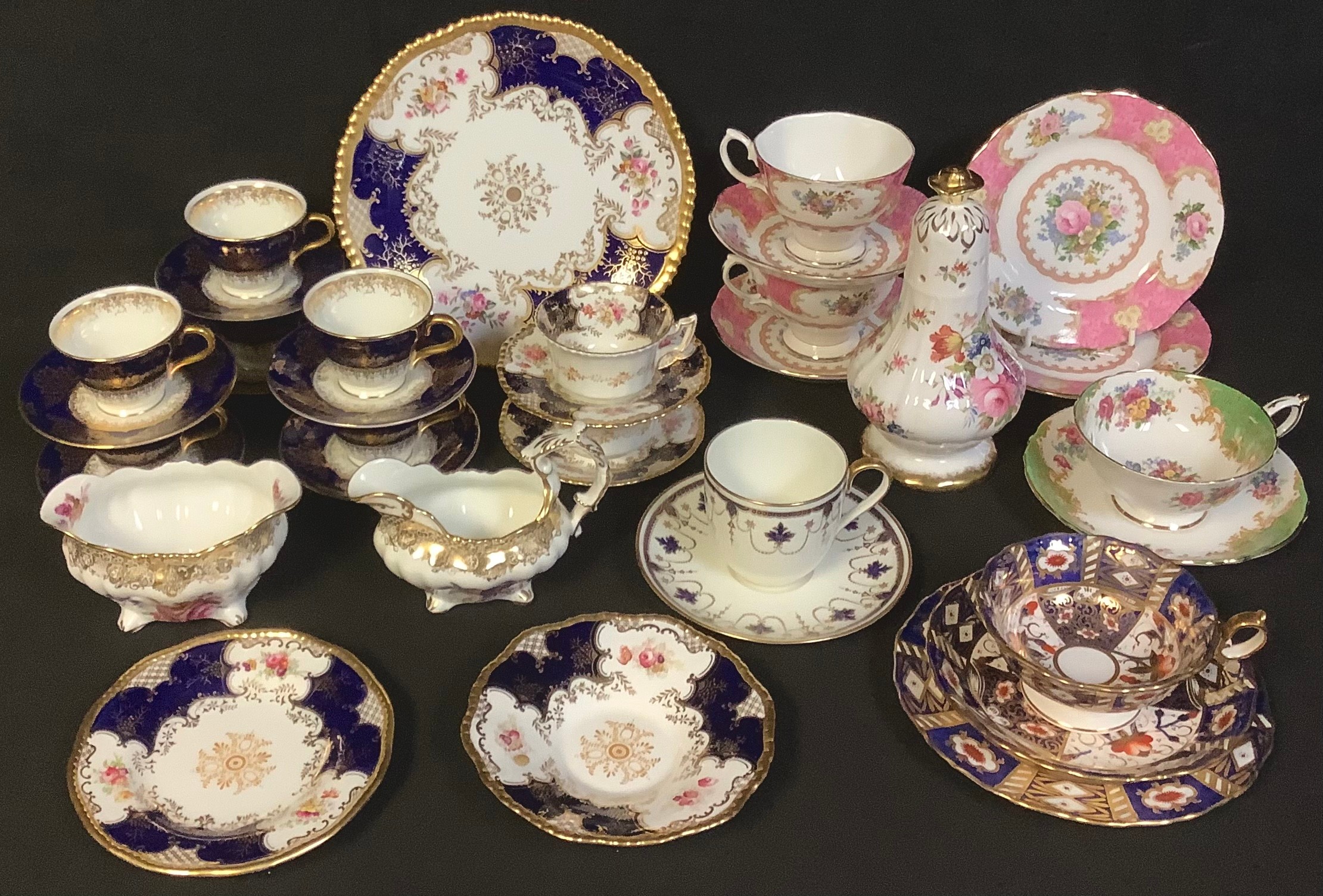 Ceramics - a set of six Coalport coffee cups and saucers; a Coalport cabinet trio; a Hammersley
