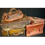 Vintage Luggage - an early 20th century leather suitcase, bearing labels; a Gladstone type leather