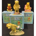 A Royal Doulton Winnie-the-Pooh model, The Honey Pot, boxed; others, The Candle, boxed; The