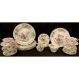 A Wedgwood Charnwood pattern tea and dinner set for six, printed with butterflies and summer flowers