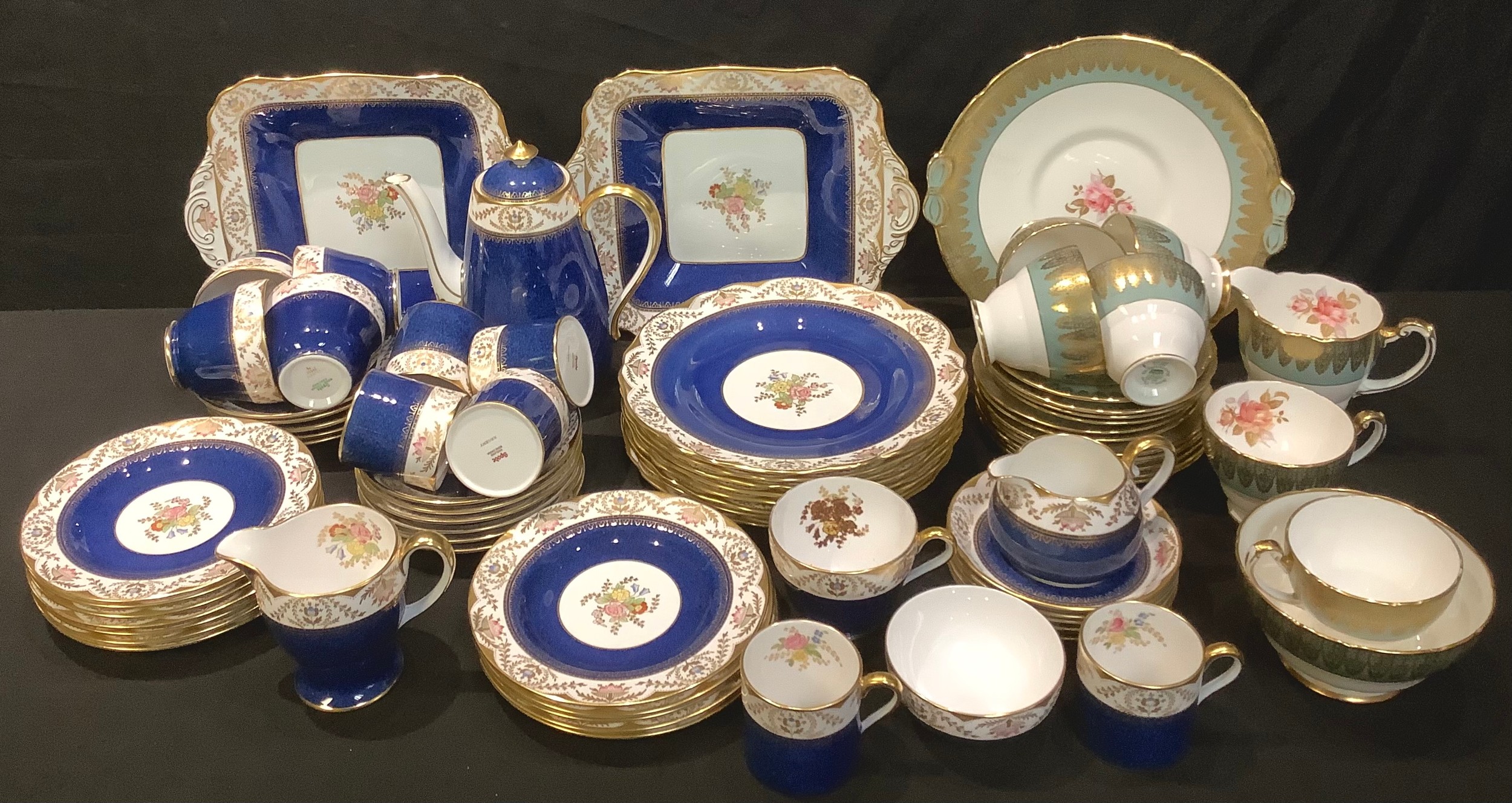 A Spode Regent part tea and coffee service comprising cake plates, dessert plates, side plates,