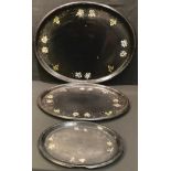 A set of three 19th century graduated oval papier mache trays, mother-of-pearl inlaid