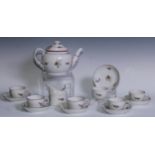 An 18th century Coalport part tea service, comprising boat shaped teapot, cream jug, six cups and