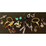 A marcasite and enamel parrot brooch; galleon brooch; silver earrings; pendants; etc