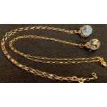 A 9ct gold necklace chain with a crystal spherical swivel pendant, marked 375; another the same,