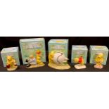 A Royal Doulton Winnie The Pooh model, Christopher Robin and Pooh WP10, 70 Years backstamp, boxed;