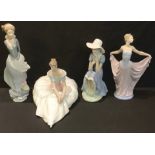 A Lladro figure, The Dancer; another, Girl With Book; a Nao figure, Hope; another, Girl In Bonnet (