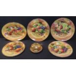 A pair of Brookdale cabinet plates painted by J Mottram, signed, decorated with ripe fruits and