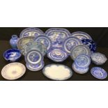 A Staffordshire blue and white transfer printed plate, vegetable dish and cover, graduated platters,