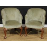 A pair of George II Revival walnut tub chairs, possibly Irish, stuffed-over upholstery, cabriole