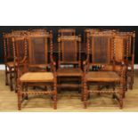 A set of twelve Jacobean style dining chairs, comprising ten side chairs and a pair of carvers,
