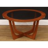 A retro design coffee table, in the manner of Victor Wilkins, 40.5cm high, 76.5cm diameter